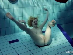 JerkMania presents: Blonde goes for a swim and strips