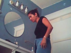JerkMania presents: Voyeur camera captures naked chick in bathroom