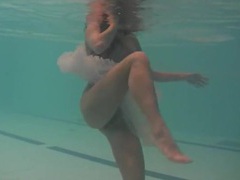 JerkMania presents: Sheer white dress on a teen swimming in the pool